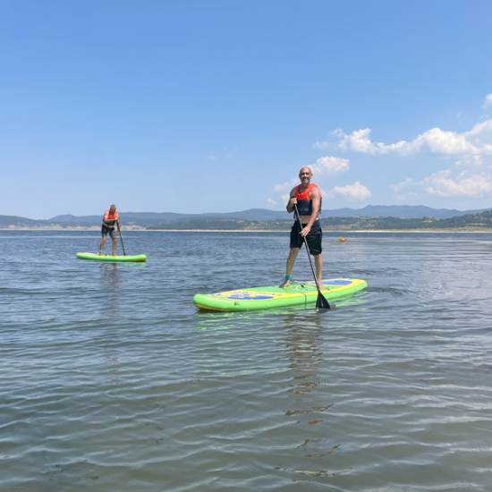 Fun in the water with 1 hour of paddle boarding at Batak Dam from Makaroon